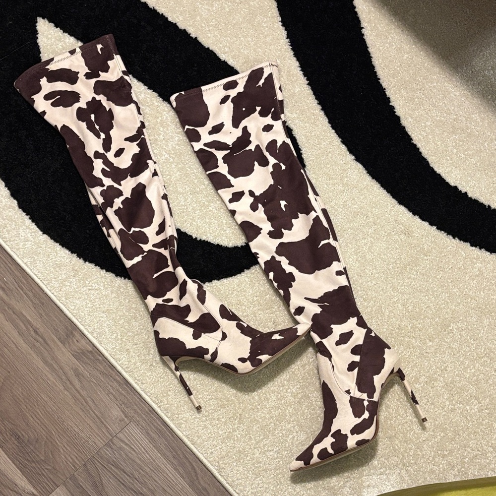 Steve Madden VAVA cow print thigh high Boots